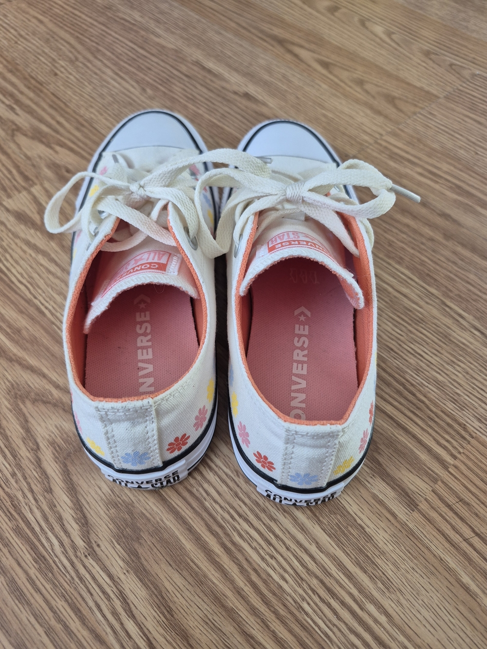 Converse Low Top Sneakers in Cream with Pink Lining and Multicolor Flowers